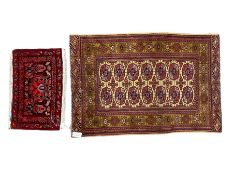 Persian Bokhara fuschia ground rug