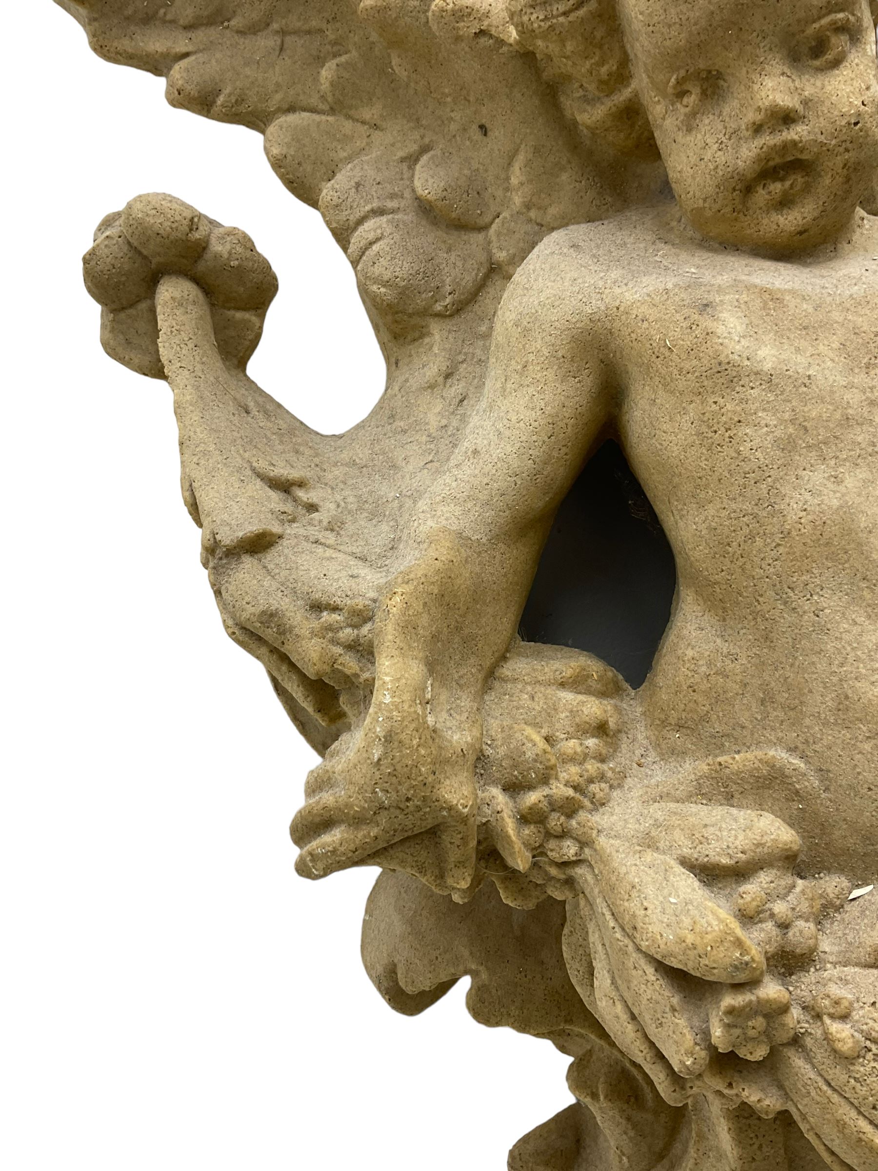 Sandstone finish moulded fibre-glass wall mounting figure of a winged cherub - Image 4 of 5