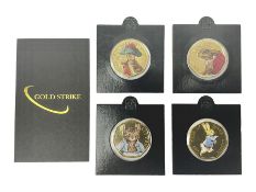 Four gold plated and coloured commemorative fifty pence coins