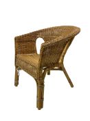 Wicker tub shaped armchair