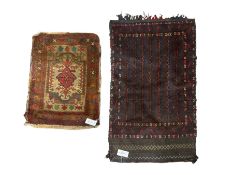 Afghan Baluchi indigo saddle bag (94cm x 57cm); and small Persian saddle bag (67cm x 48cm)