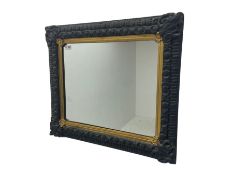 Small black painted and gilt wall mirror