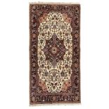 Persian ivory ground rug
