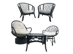 Mid-20th century conservatory suite: pair ebonsided bamboo tub shaped armchairs