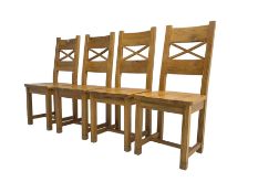 Set four oak dining chairs with x-frame back