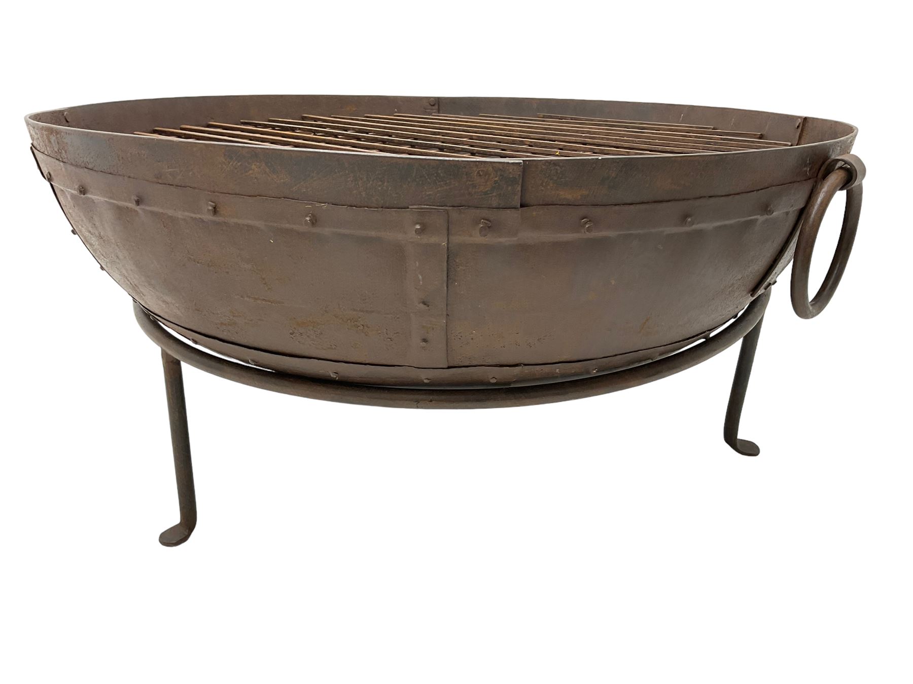 Circular riveted iron fire pit
