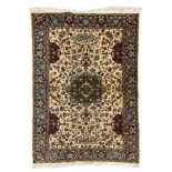 Persian ivory ground rug