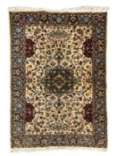 Persian ivory ground rug