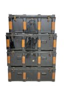 Set four early to mid-20th century metal and wood-bound travelling trunks (three at: W94cm