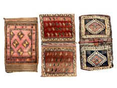 Antique Persian red ground saddle bag
