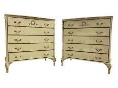 Pair French design cream and parcel-gilt chests