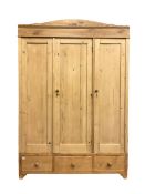 Early 20th century Continental pine triple wardrobe