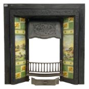 Early 20th century cast iron tiled fire surround
