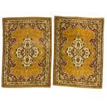 Pair Persian design amber ground rugs
