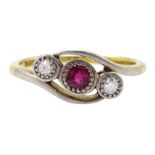 Early 20th century gold ruby and illusion set diamond crossover ring