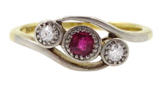 Early 20th century gold ruby and illusion set diamond crossover ring