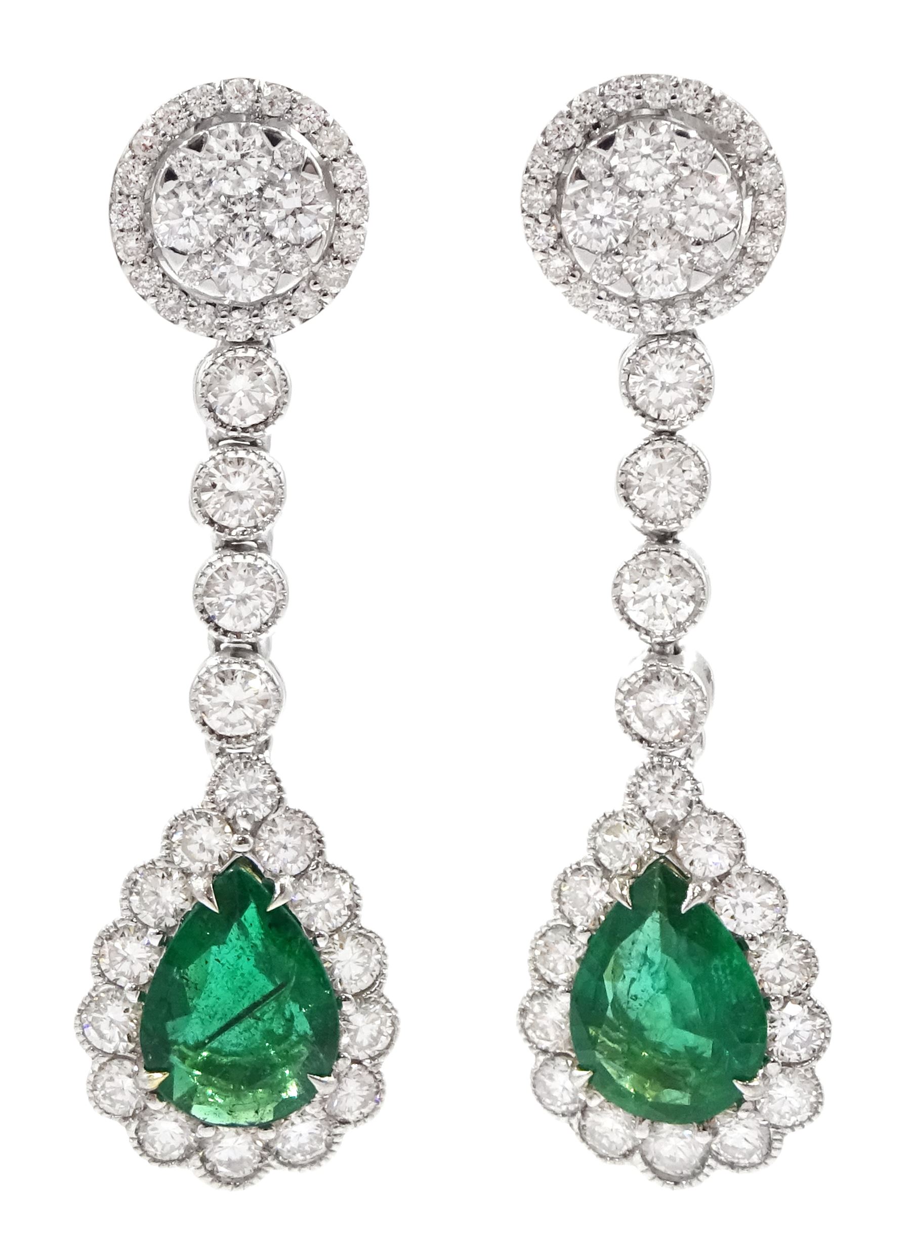 Pair of 18ct white gold pear cut emerald and round brilliant cut diamond pendant stud earrings