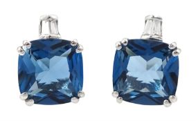 Pair of 9ct white gold cushion cut London blue topaz and tapered baguette cut diamond stud earrings