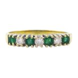 18ct gold seven stone emerald and round brilliant cut diamond ring