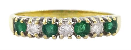 18ct gold seven stone emerald and round brilliant cut diamond ring