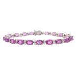 18ct white gold oval pink sapphire and round brilliant cut diamond bracelet