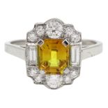 Platinum emerald cut yellow sapphire