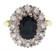 18ct gold oval sapphire and round brilliant cut diamond cluster ring