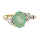 14ct gold oval cut emerald and diamond ring