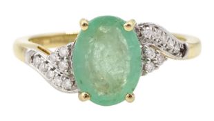 14ct gold oval cut emerald and diamond ring