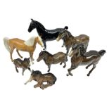 Seven Beswick horses