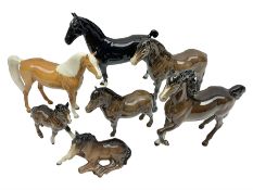 Seven Beswick horses