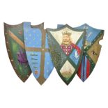 Four decorative painted wooden wall mounting shields