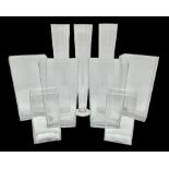 Four large glass vases