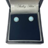 Pair of silver and opal stud earrings