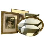 Gilt framed oval wall mirror