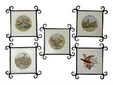 Four Minton tiles decorated with game birds