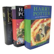 Three Harry Potter first edition hardbacks comprising the Half Blood Prince and two copies of the De