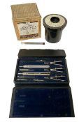 Charvos cased set of drawing instruments together with Johnson adjustable developing tank