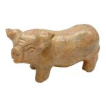 Carved calcite figure in the form of a pig