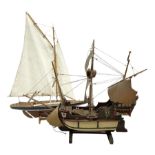 Wooden model of a schooner together with another similar example
