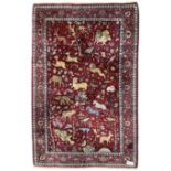 Persian Kashan design crimson ground rug