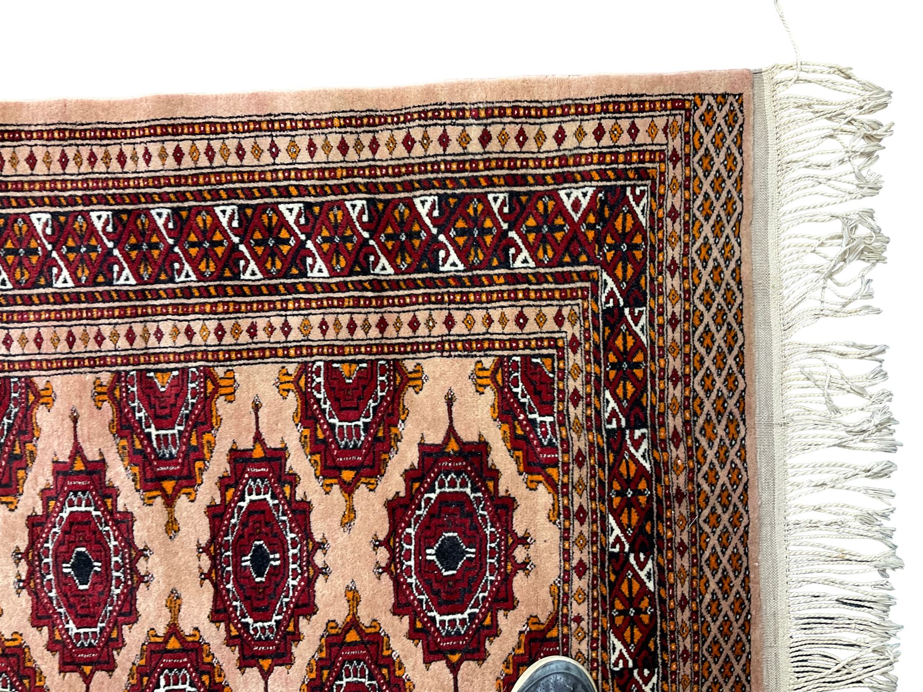 Persian Bokhara peach ground rug - Image 2 of 5