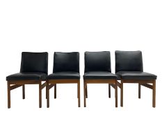 Set four teak chairs upholstered in black faux leather