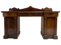 Early 19th century mahogany reverse break-front twin pedestal sideboard