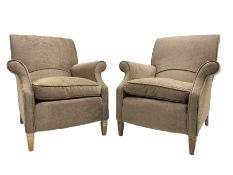 Pair of traditional shaped armchairs