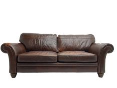 Traditional shaped large two seat sofa with scrolled arms