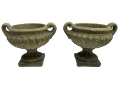 Pair of cast stone garden squat urns