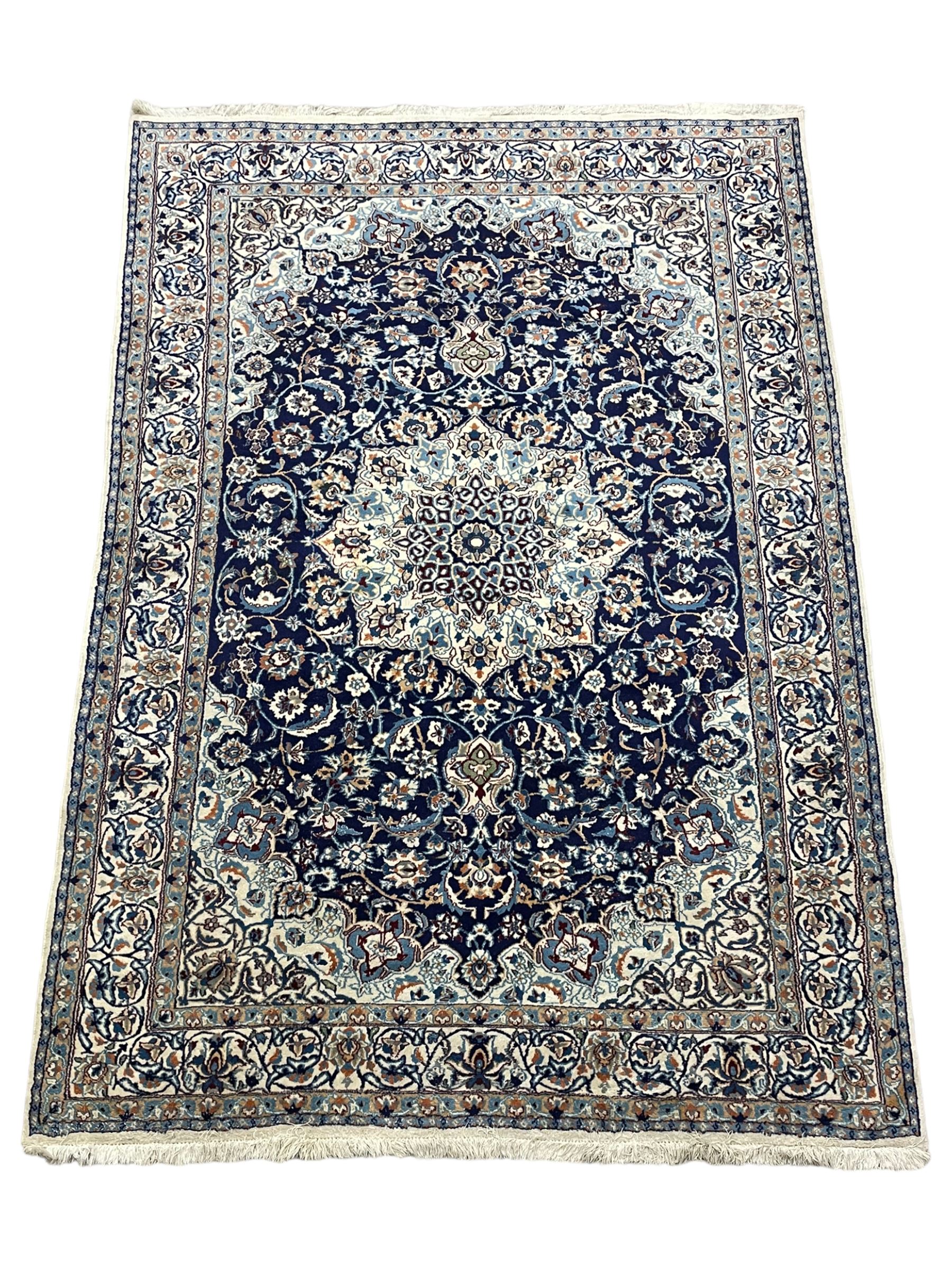 Persian Nain indigo and ivory ground rug