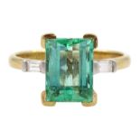18ct gold three stone octagonal cut emerald and baguette cut diamond ring