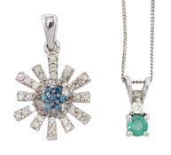 9ct white gold blue and white diamond starburst pendant and a 9ct white gold emerald and diamond pen